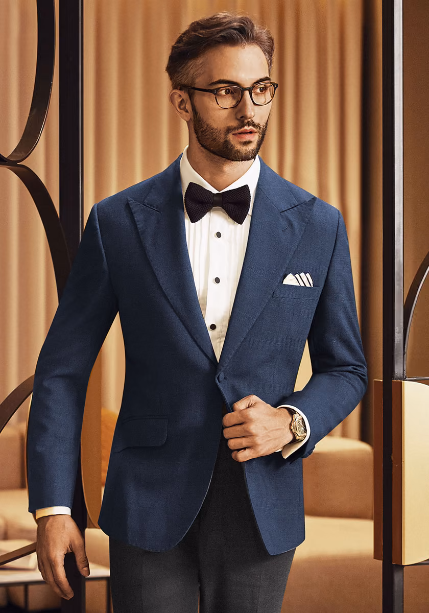 Adrien Lahoussaye in a dinner jacket and bow tie